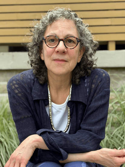 author ronna bloom posing for a publicity photo outside